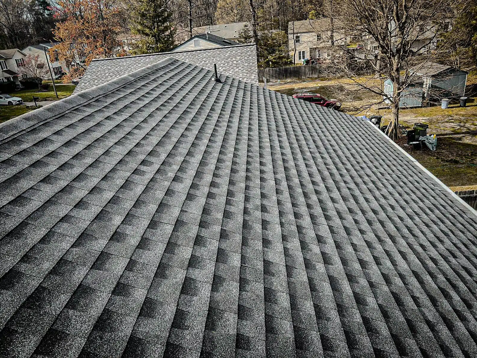 Ridgetop completed shingle roof viewed along the ridge